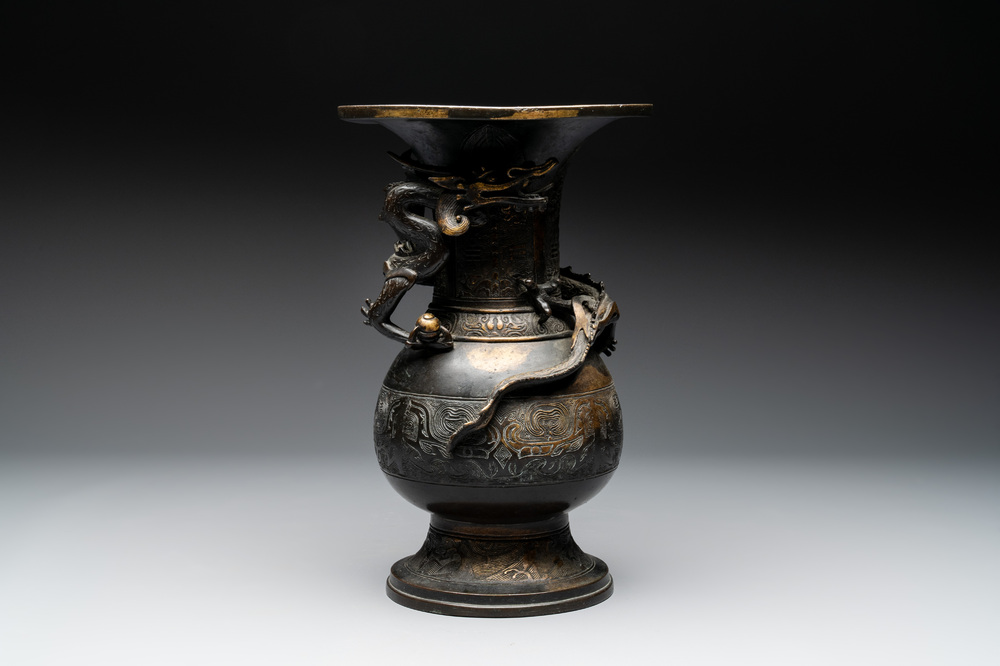 A Chinese archaistic bronze gold-splashed 'dragon' vase, Dong 東 mark, Ming
