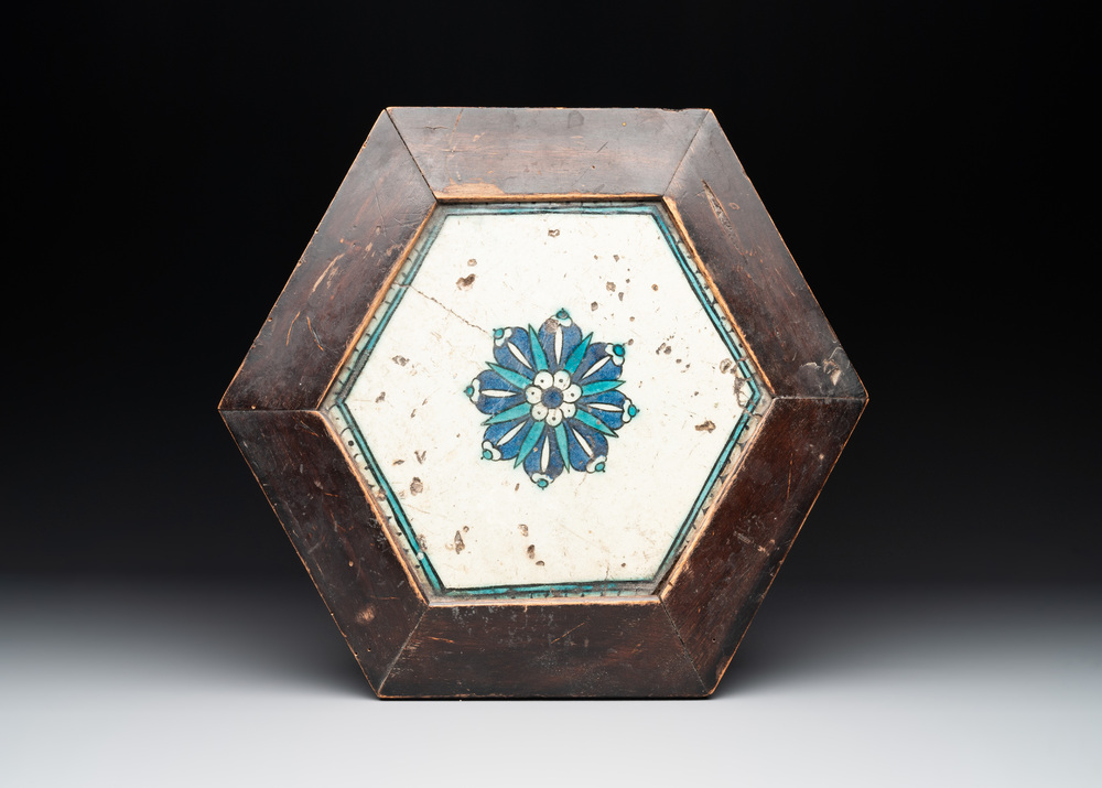A hexagonal tile with stylised floral design, Damascus, 17th C.