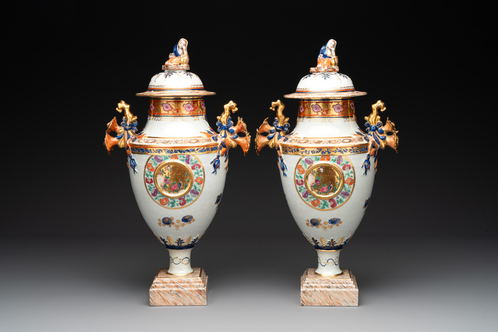 A pair of Chinese export famille rose urns and covers, Qianlong