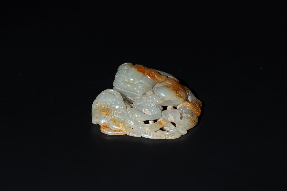 A Chinese jade carving with two Buddhist lions, 19th C.