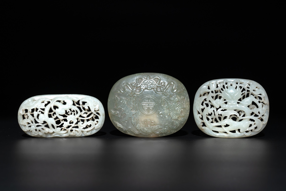 Three Chinese reticulated jade plaques, Ming/Qing