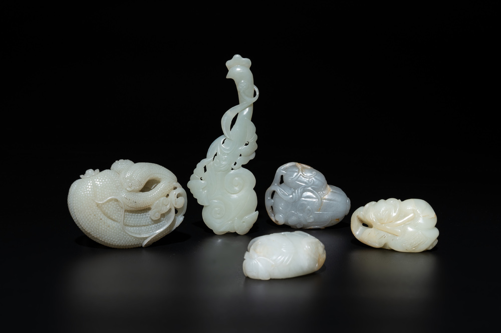 Five Chinese white, celadon and russet jade carvings of three melons, a lotus pod and a lingzhi, 19th C.