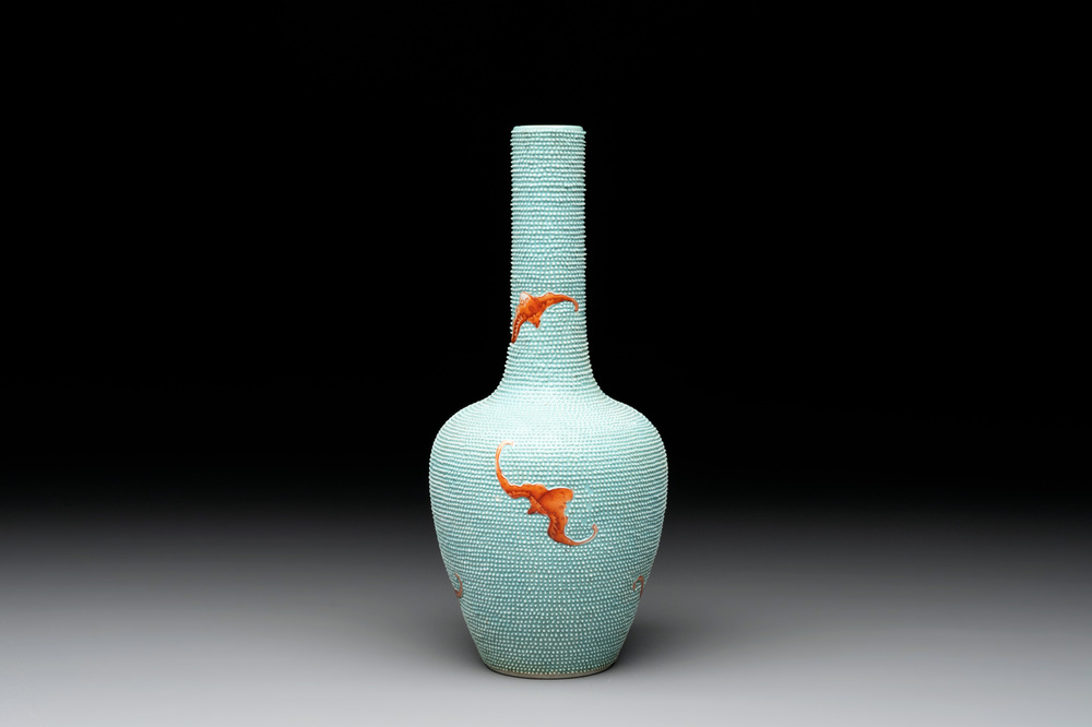 A Chinese iron-red-decorated turquoise-ground bottle vase with bats, Qianlong mark, 20th C.