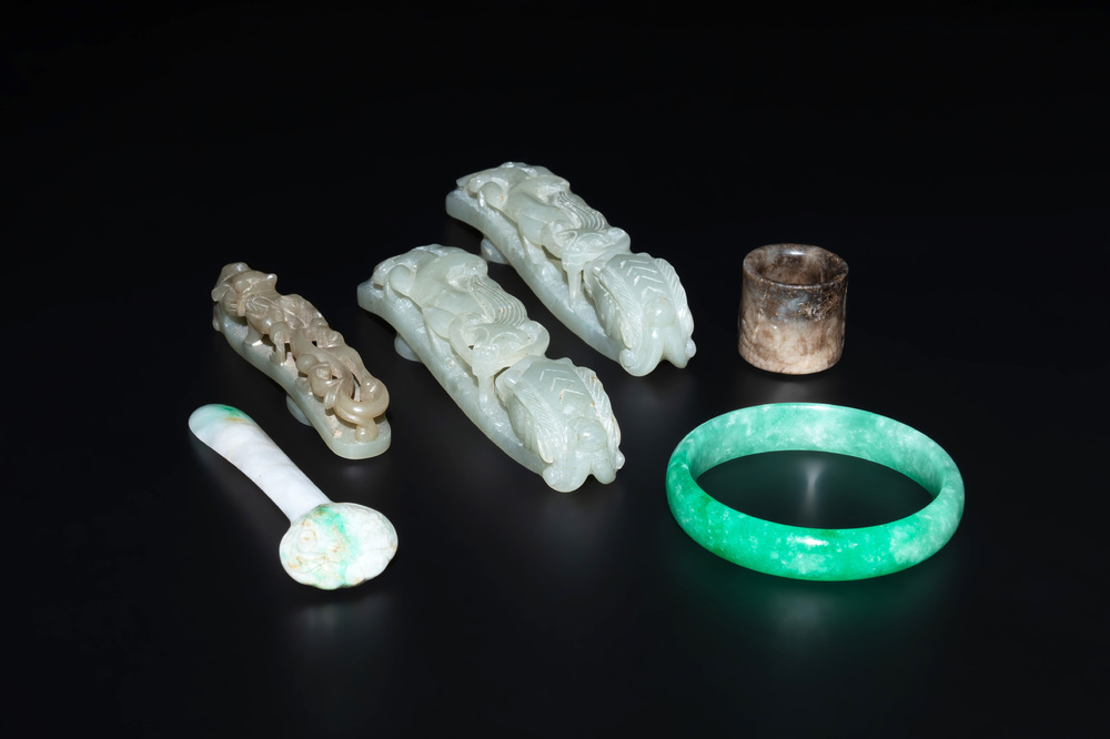 Three Chinese jade belt hooks, a hairpin, a bangle and an archer's ring, 19/20th C.