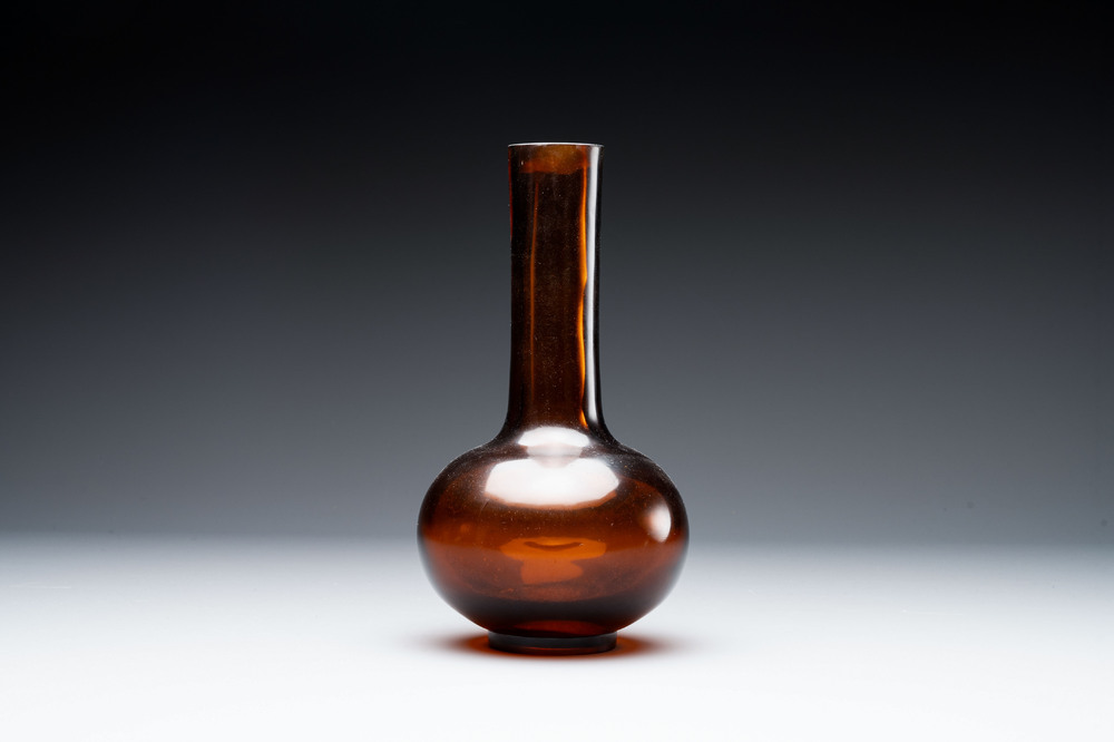 A rare Chinese translucent amber-coloured Peking glass bottle vase, Qianlong mark and of the period