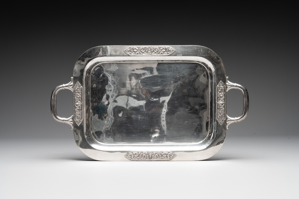 A sterling silver tray with two handles, Southeast Asia, 19/20th C.