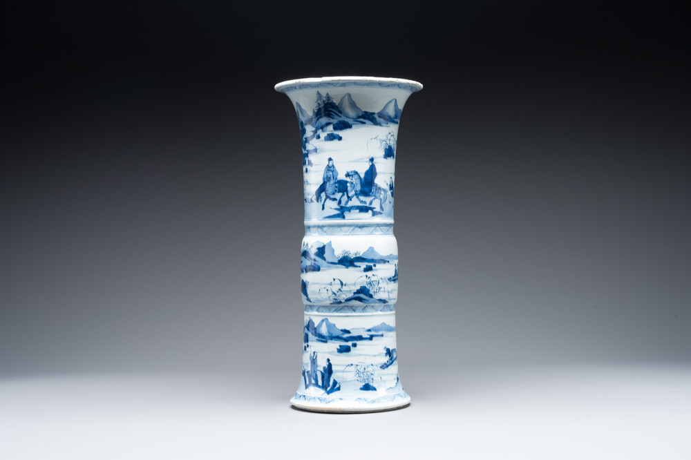 A large Chinese blue and white 'gu' vase with figures in landscapes, Kangxi