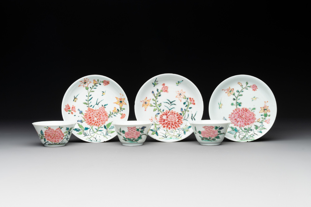Three Chinese famille rose 'birds and flowers' cups and saucers, Yongzheng