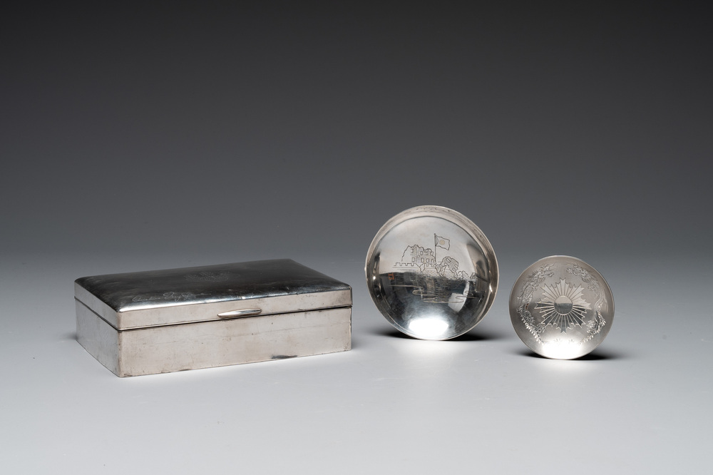 A Japanese silver cigar box with imperial crest and two commemorative silver sake cups, 19/20th C.