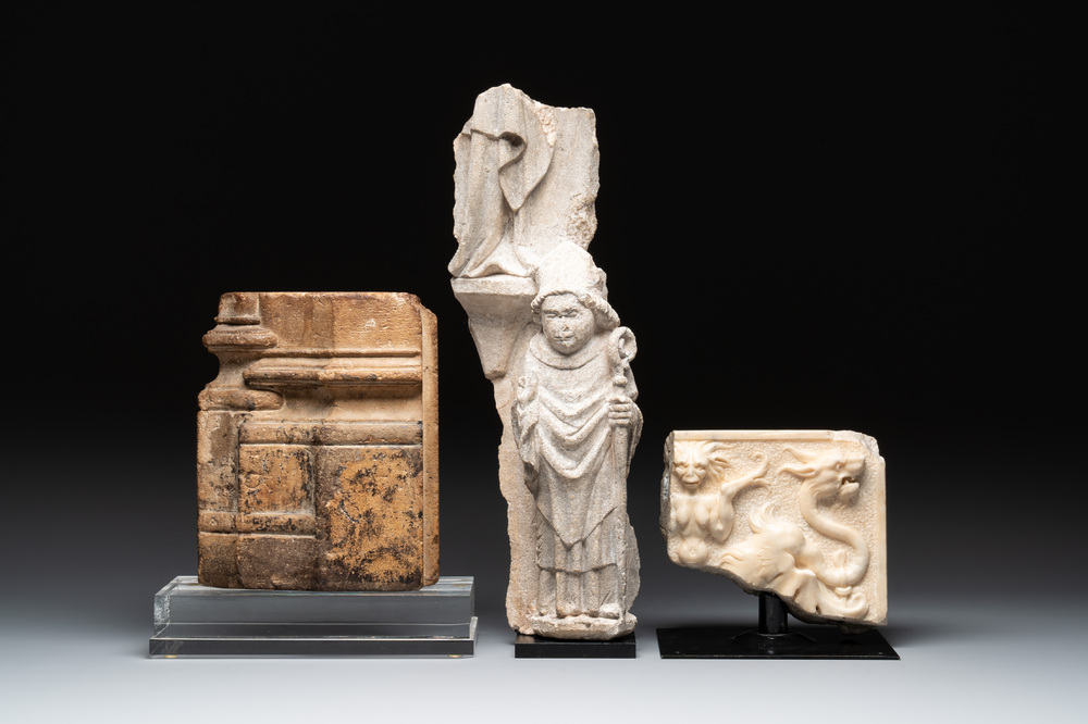 Two sculptured marble fragments and a limestone fragment, France, 14/16th C.