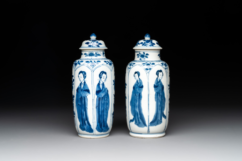 A pair of Chinese blue and white 'Long Eliza' vases and covers, jade mark, Kangxi