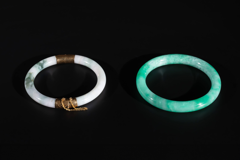 Two Chinese jadeite bracelets, one with 14K gold mounts, 19/20th C.