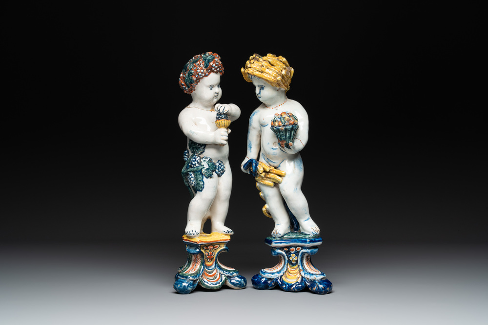 Two polychrome Dutch Delft allegorical figures of the four seasons, 18th C.