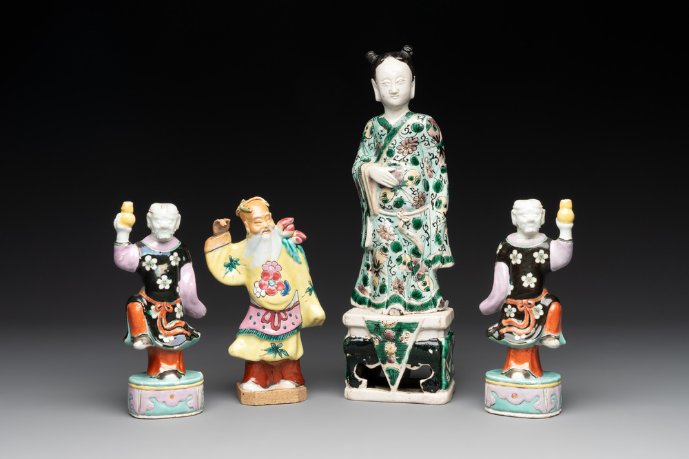A Chinese verte biscuit figure and three famille rose figures, 18/19th C.