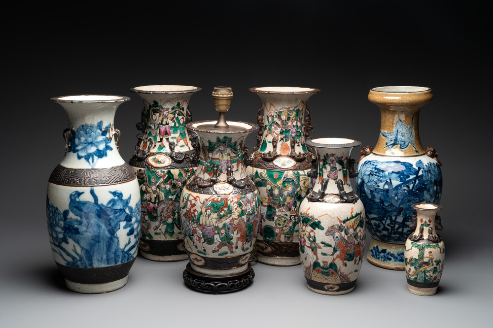 Seven Chinese Nanking blue and white and famille verte crackle-glazed vases, 19/20th C.