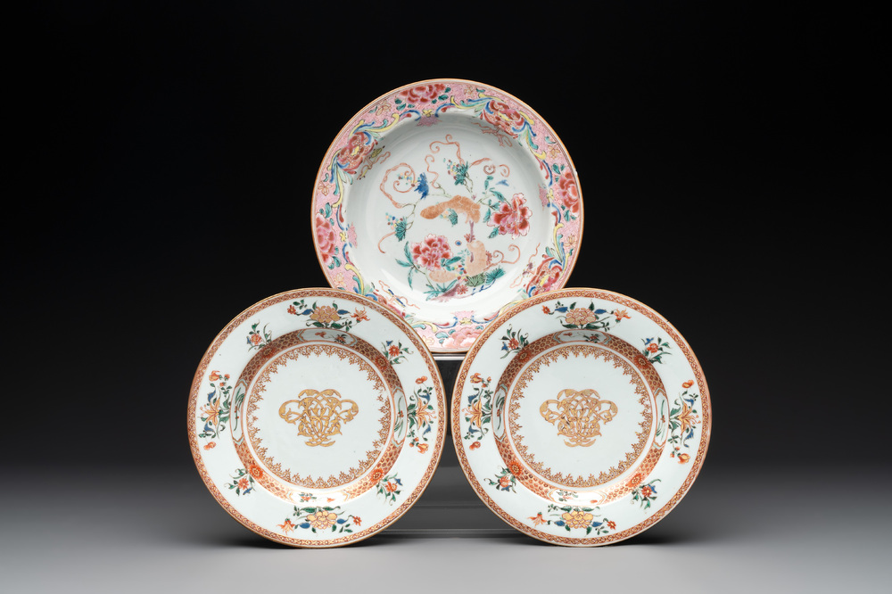 A pair of Chinese armorial monogrammed plates and a famille rose plate, Kangxi/Yongzheng