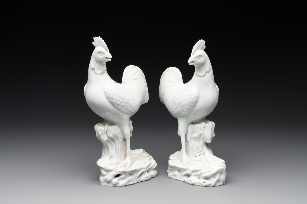 A pair of Chinese Dehua blanc de Chine models of roosters, 18th C.