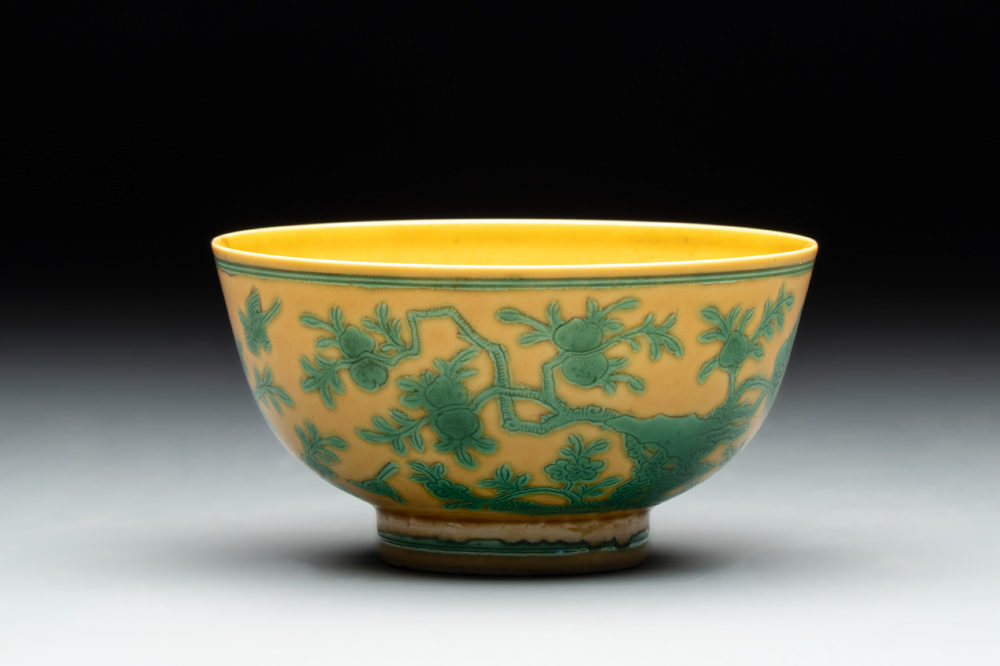 A Chinese yellow-ground 'birds and peaches' bowl, Guangxu mark and possibly of the period
