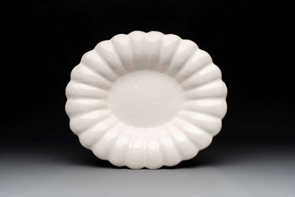 A rare gadrooned oval white Delftware dish, 17th C.