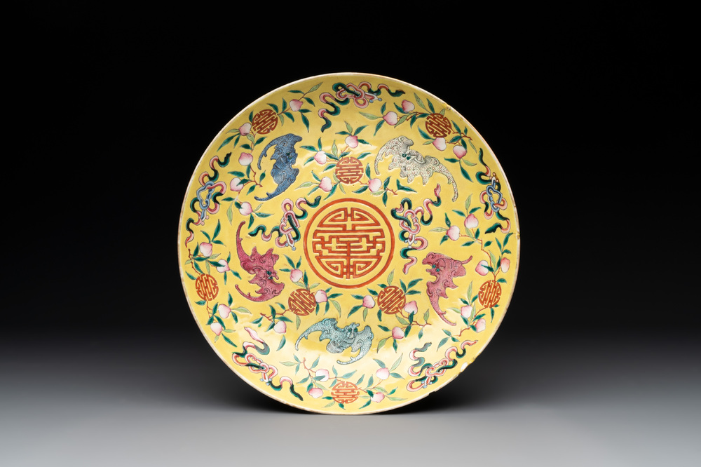 A Chinese famille rose yellow-ground 'bats and peaches' plate, Tongzhi mark and of the period