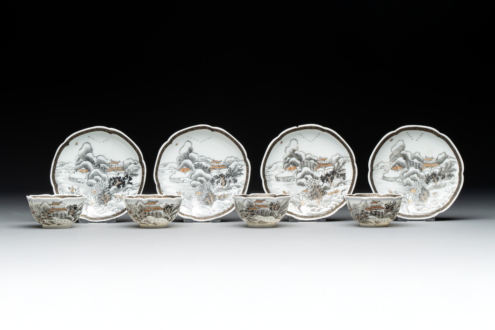 A set of four Chinese gilt-decorated grisaille 'landscape' cups and saucers, Yongzheng/Qianlong