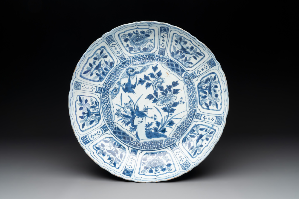 A Chinese blue and white 'kraak' dish with two magpies and peonies, Wanli