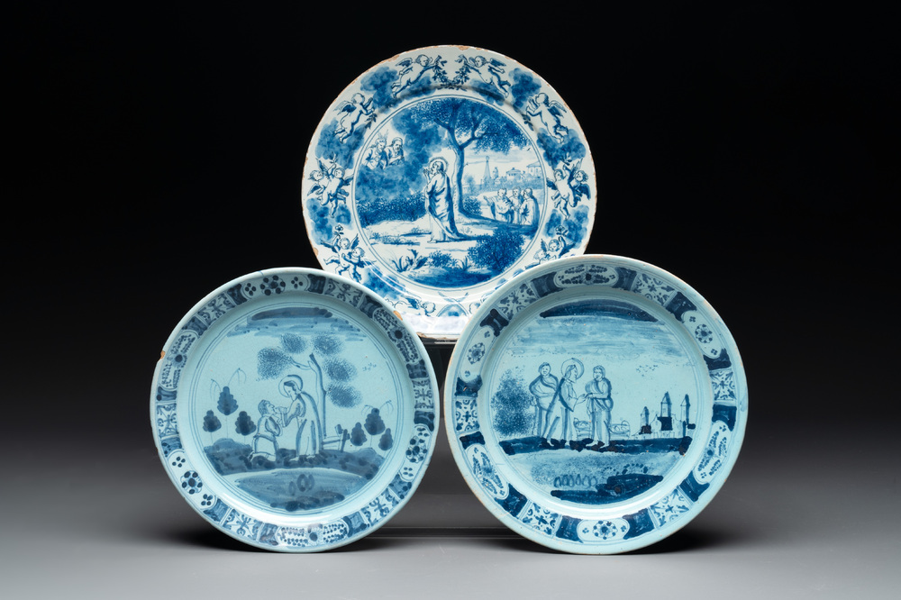 Three blue and white Delftware 'biblical subject' plates, Delft and Nurenberg, 18th C.