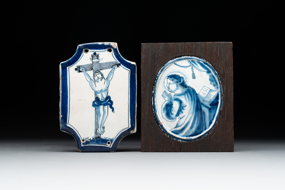 A rare small blue and white Dutch Delft 'Crucifixion' plaque and a 'Mary Magdalene' medallion, 18th C.