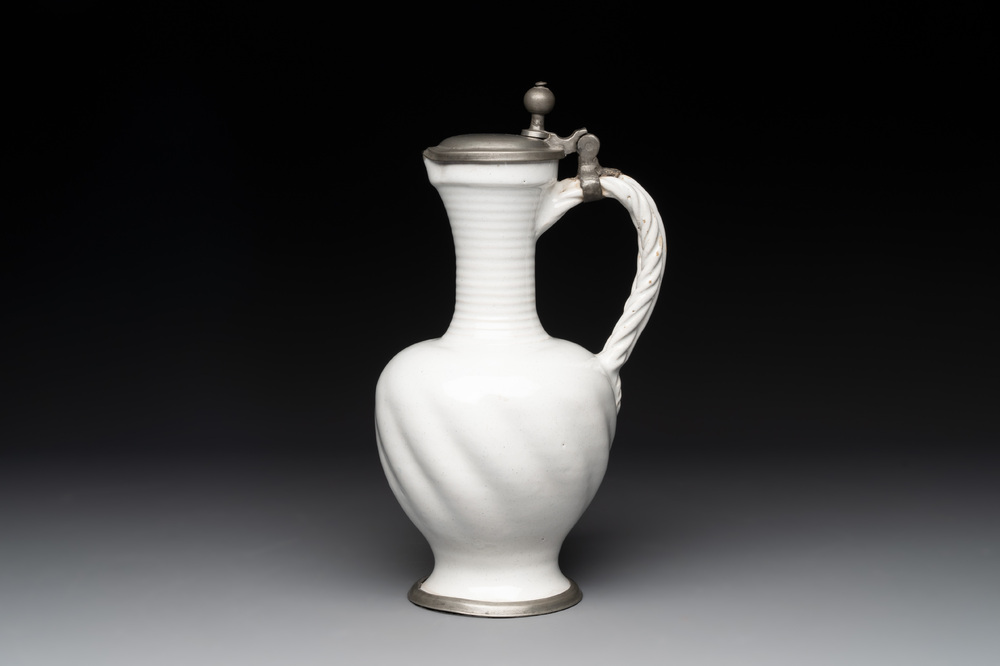A pewter-mounted white Dutch Delftware jug, 17th C.