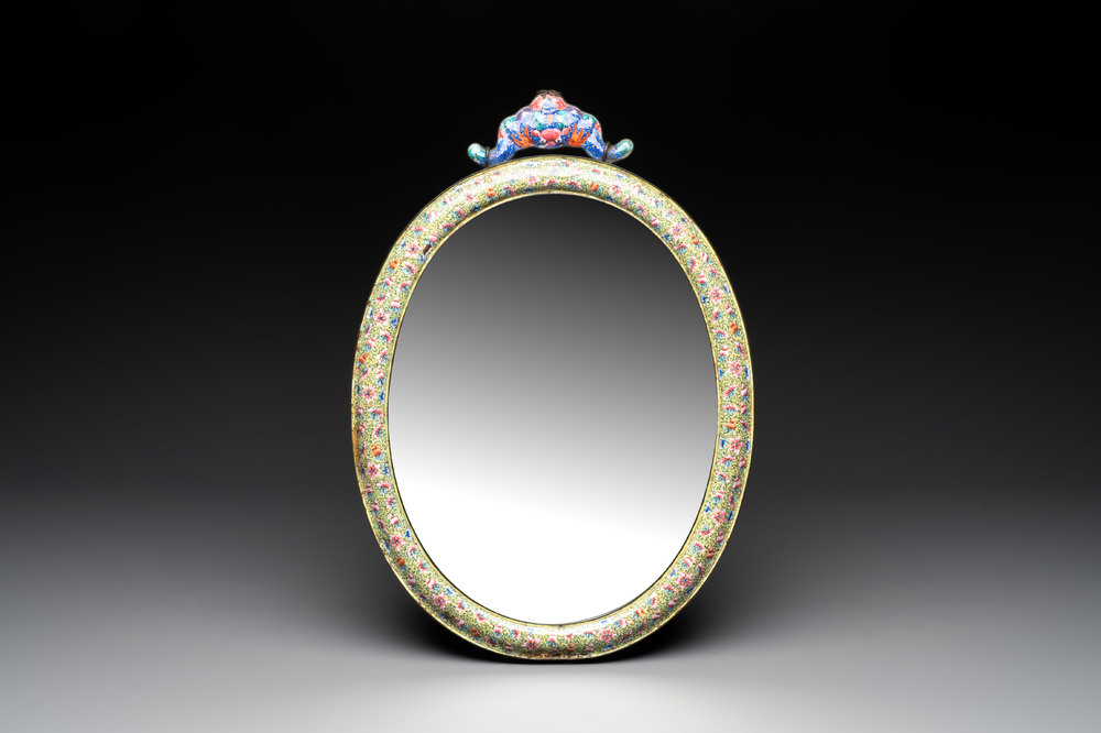 A large oval Chinese Canton enamel mirror, Qianlong