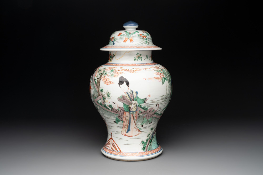A Chinese famille verte 'ladies and boys' vase and cover, Kangxi
