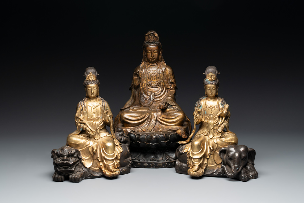 A Chinese parcel-gilt bronze Guanyin and a pair of Bodhisattvas, 20th C.