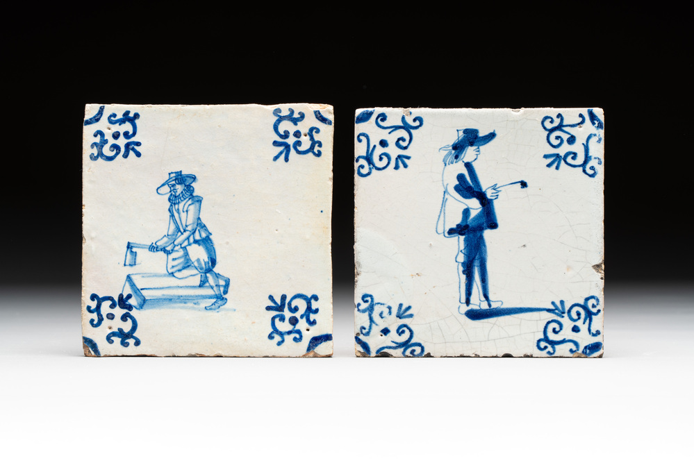 Two blue and white Dutch Delft 'pipe smoker' and 'wood worker' tiles, 17th C.