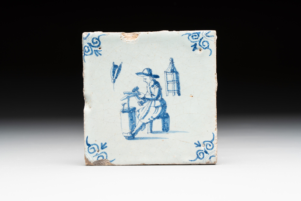 A blue and white Dutch Delft 'coppersmith' tile, 17th C.