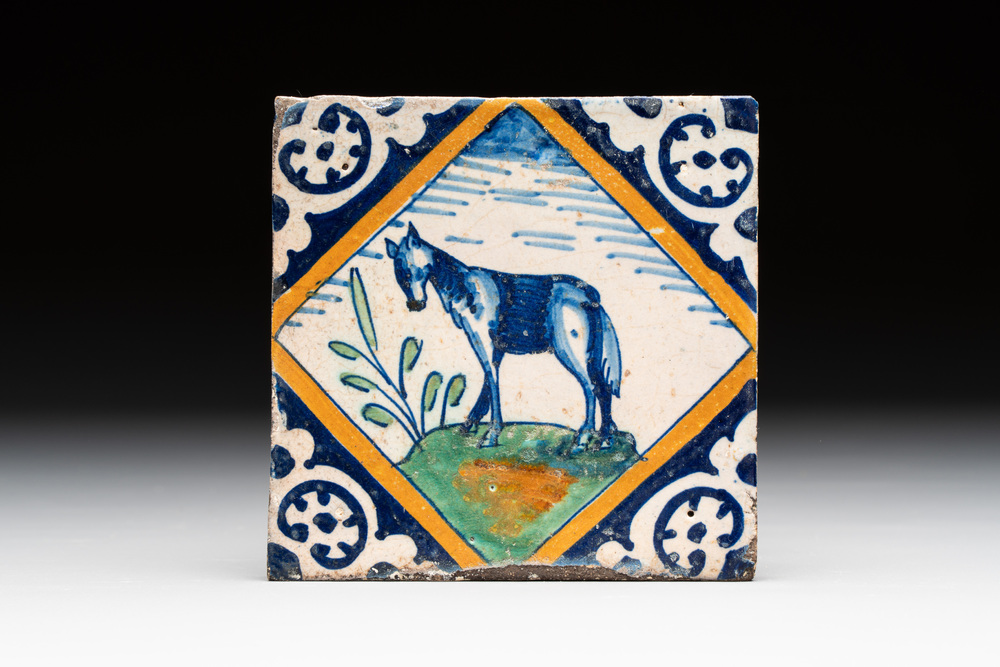 A polychrome Dutch Delft maiolica 'horse' tile, late 16th C.