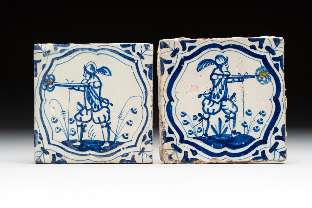 Two blue and white Dutch Delft 'soldier with coloured flame' tiles, 17th C.