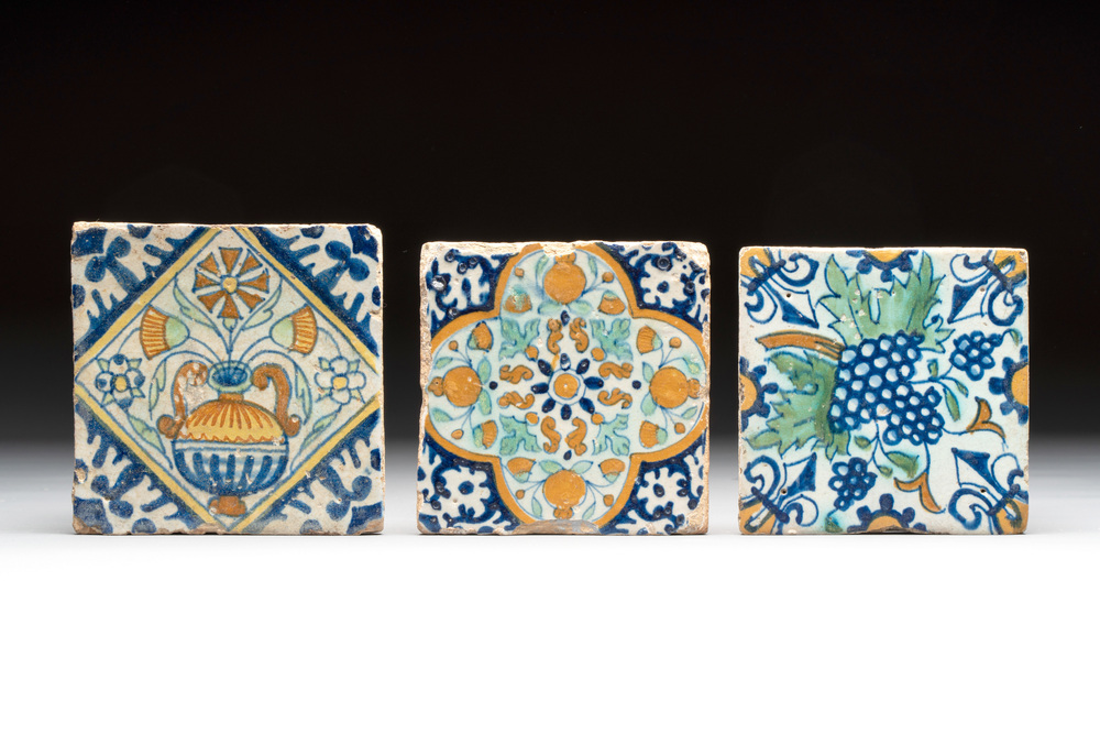 Three small polychrome Dutch Delft 'ornamental' and 'flower pot decor' tiles, early 17th C.