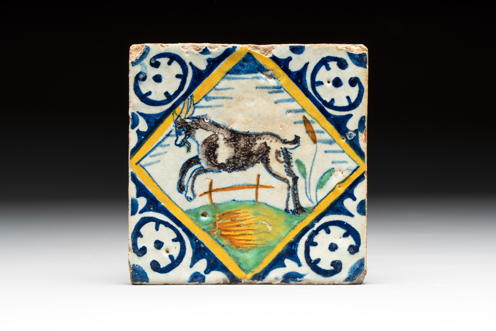 A polychrome Dutch Delft maiolica 'jumping goat' tile, late 16th C.