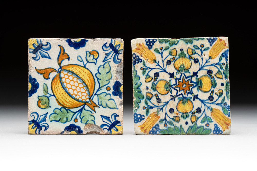 Two small polychrome Dutch Delft 'pomegranates' and 'tulips' tiles, ca. 1600