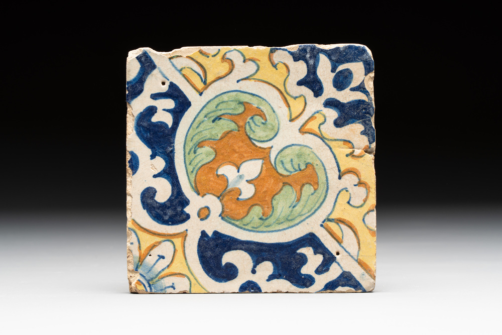A rare polychrome Dutch Delft maiolica 'nier' or 'kidney' ornament tile, late 16th C.