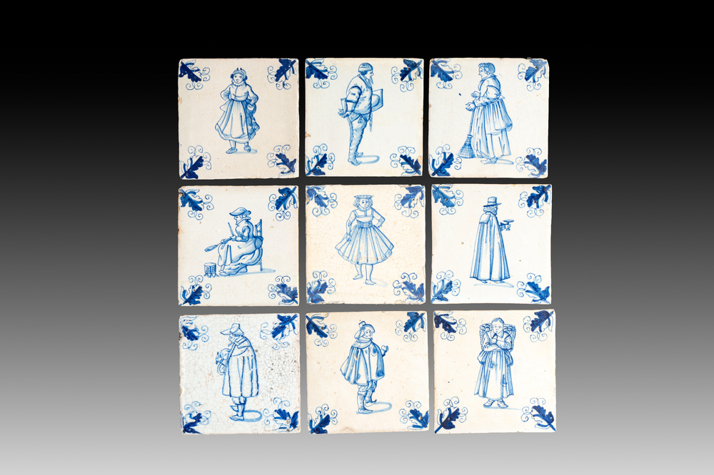 Nine blue and white Dutch Delft tiles with oak leaf corners, 17th C.