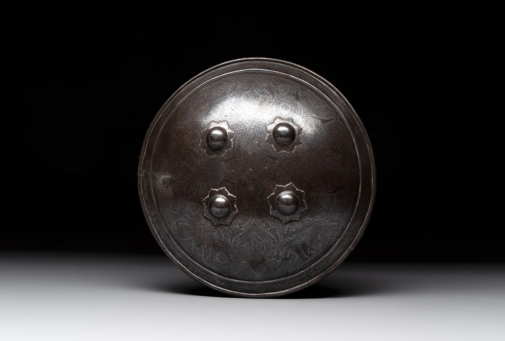 An Indo-Persian parcel-gilt and silver inlaid shield or dhal, 18/19th C.