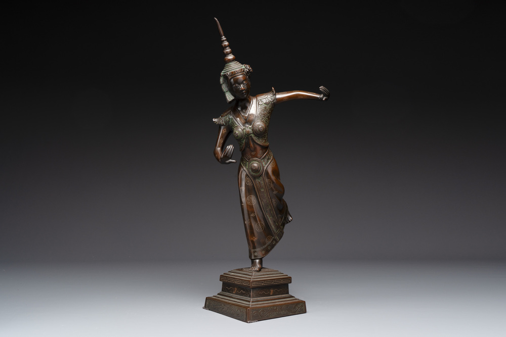 A large Vietnamese copper- and silver-inlaid bronze sculpture of a dancer, Bien Hoa school, early 20th C.