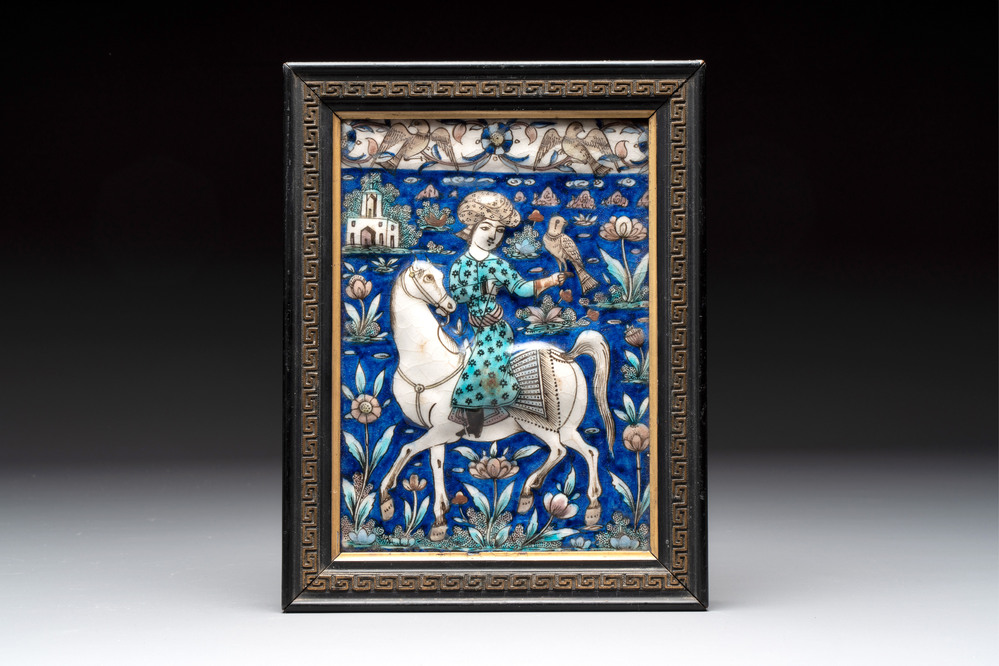 A rectangular Qajar relief-moulded tile with a prince on horseback, Iran, 19th C.