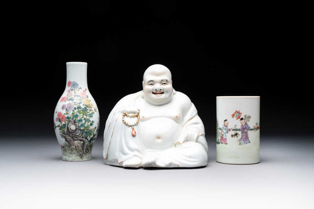 A Chinese gilt- and iron-red-decorated white-glazed Milefo Buddha, a famille rose vase and a brush pot, Qianlong and Xue Changseng 薛長森 mark, 20th C.