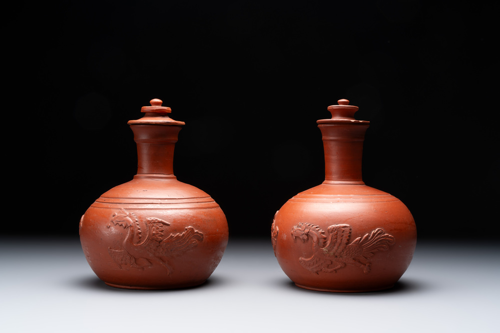 A pair of Yixing-style 'phoenix' bottle vases and covers, possibly England, 18th C.