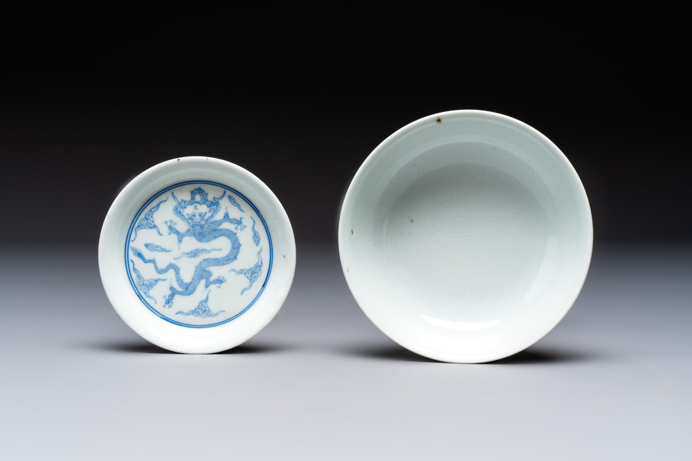 A Chinese monochrome 'anhua' 'dragon' bowl and a blue and white 'dragon' saucer, 18/19th C.