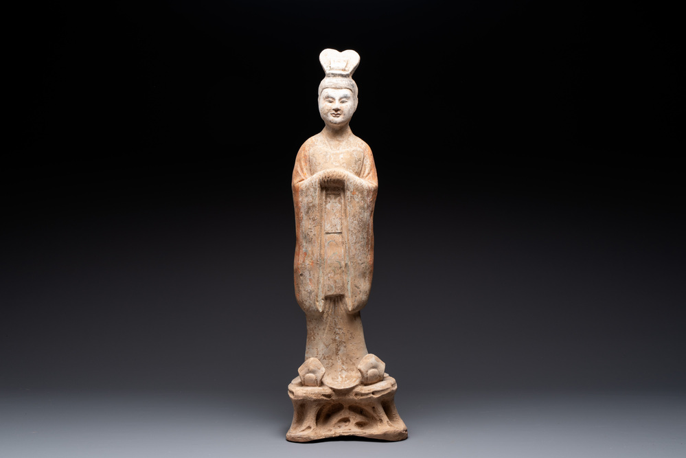 A large Chinese painted pottery figure of a civil official, Tang