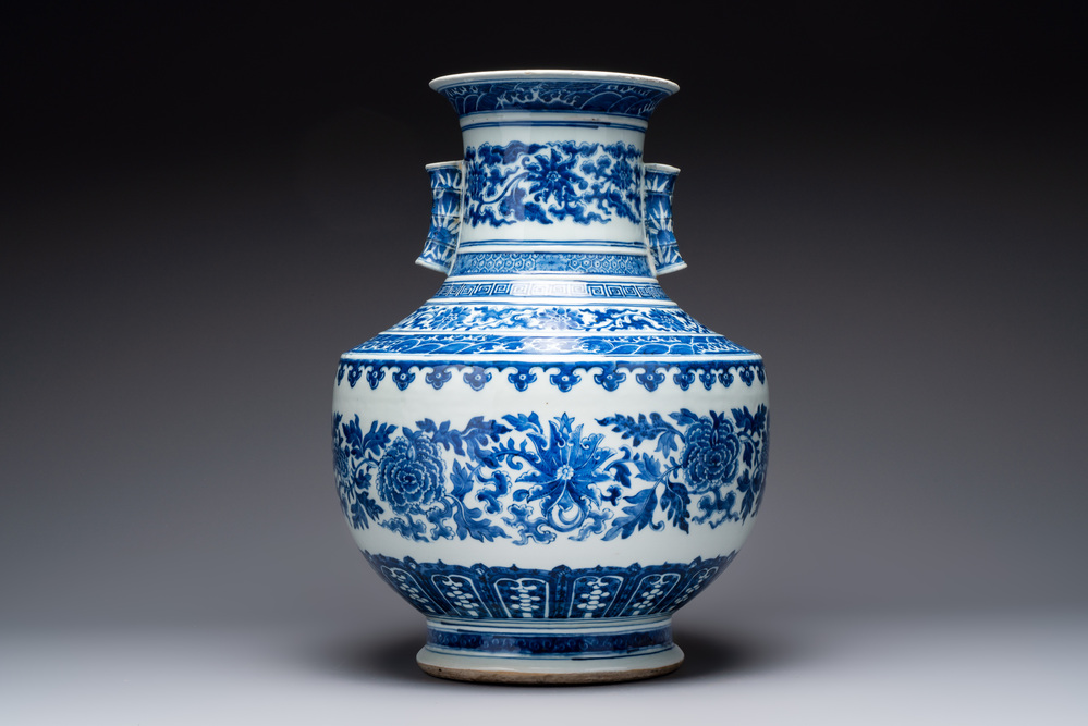 A large Chinese blue and white 'lotus and peony scroll' 'hu' vase, 19th C.