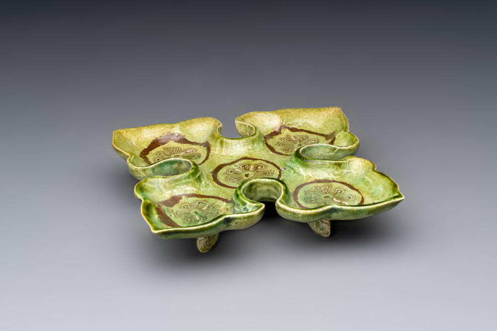 A Chinese green-glazed marbled dish, probably Tang